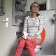 A pretty blonde woman is recorded by a hidden camera as she takes a piss and a shit while sitting on a toilet. Pissing is audible, but pooping cannot be heard. She wipes her ass thoroughly. Over 2 minutes.